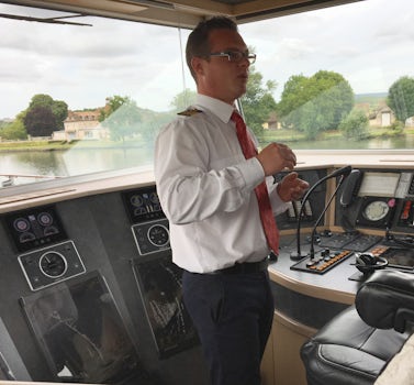 The ship’s capable, young captain explaining his work