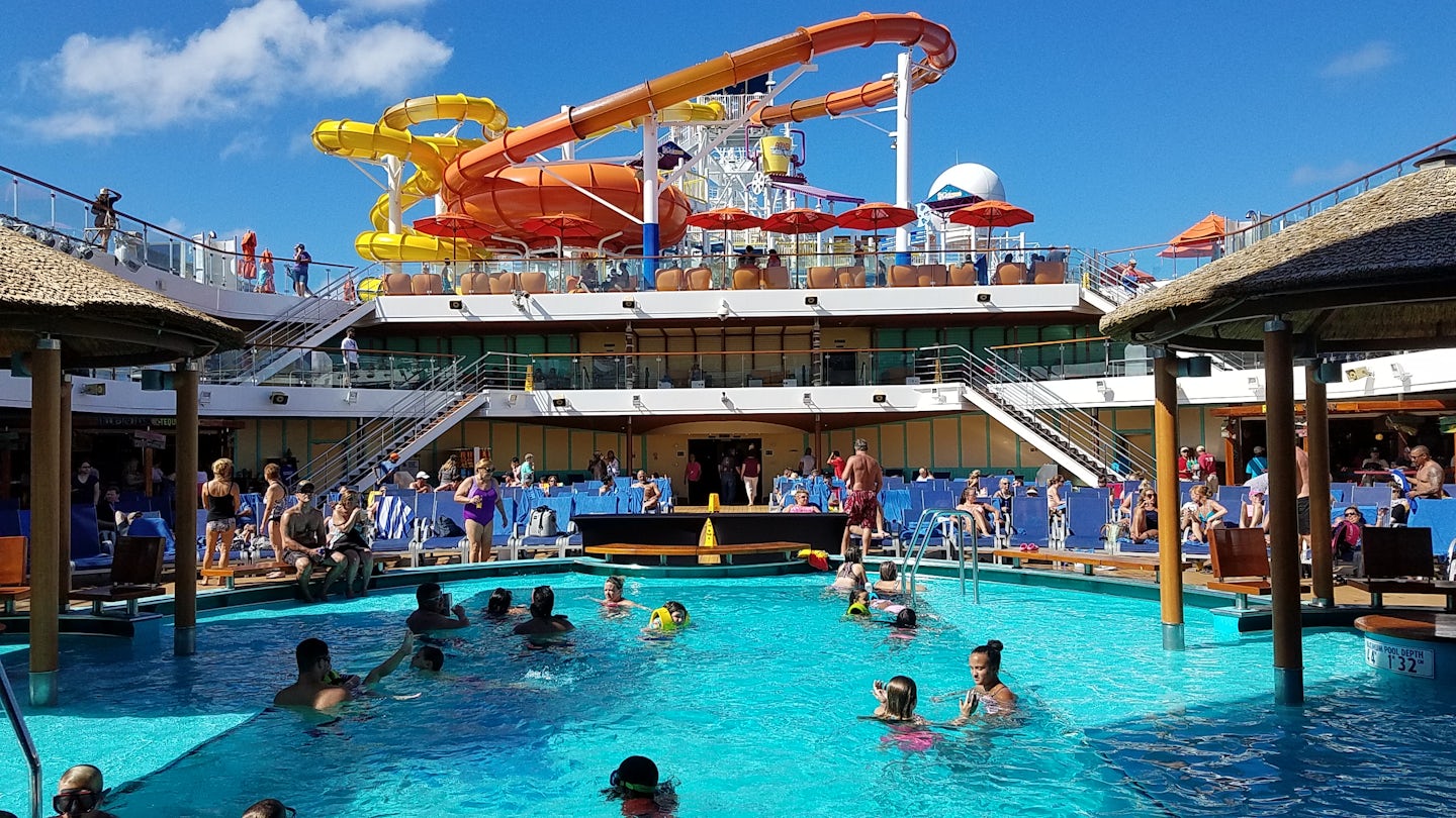 Lido deck, main, mid ship pool showing the waterslide above and beyond that
