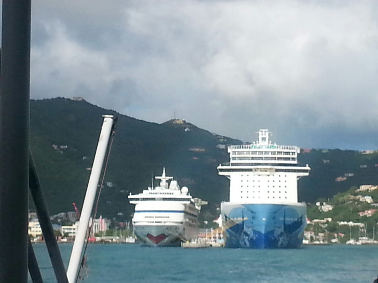 NCL Escape next to a German AIDA cruise ship