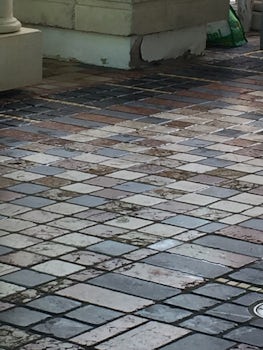 Broken, moldy tiles in the solarium