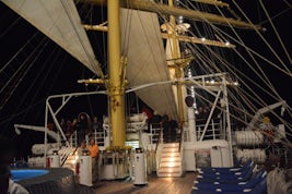 Night shot on the main deck towards the stern of the ship