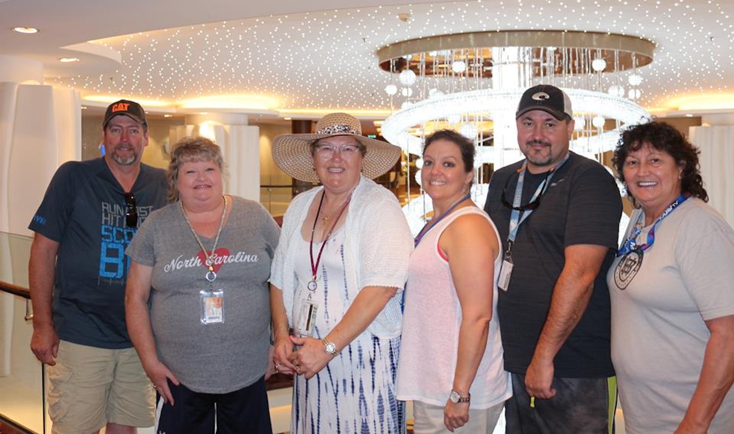 Our group in front of the chandelier in the middle of the ship
