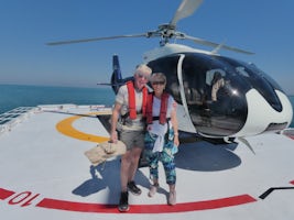 Vivien and Deke by the helicopter