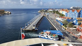 Curacao with the pontoon pedestrian bridge open to let ships through!