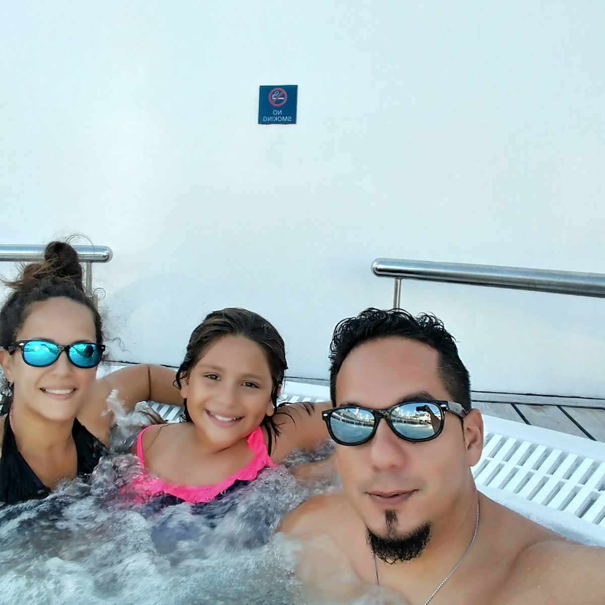 My hubby,little & I relaxing in 1 of the Jacuzzis on the cruise