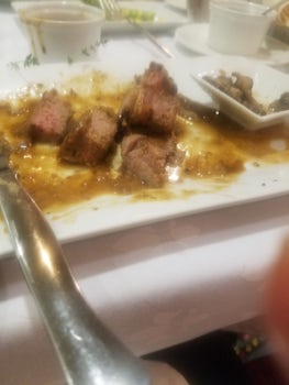 Paid extra for the specialty dining with a request for a well done steak. Steak was delivered medium. In an attempt to make it right, they overcooked the steak, thereby making it rubbery and chewy. With that, they still tacked on 18% gratuity.