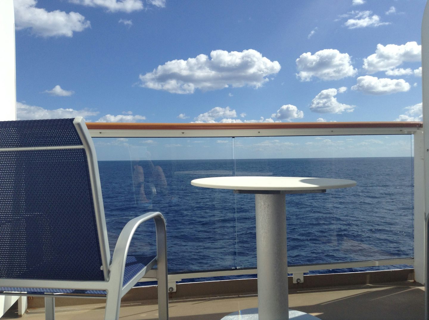 balcony mini suite. Not as nice or big as smaller ships.  Staff congregated to smoke on the deck. Water dripped