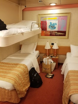 Two twin beds and an upper pullman