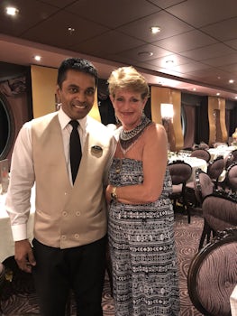 Our Dinner waiter, Dhapam.  This was his second week on the ship.  He was nervous the first night, but after that, the waiters were fighting o get our table.  We were laughing and having fun - All without alcohol!  He was wonderful!