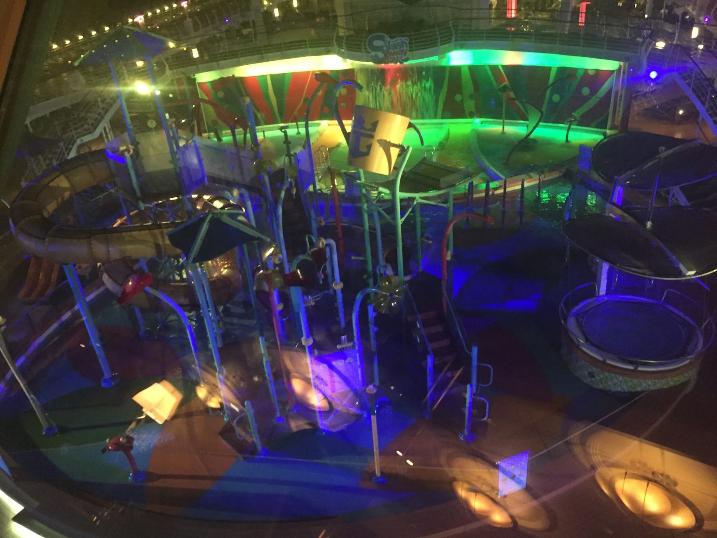 This is a view of the kids splash park area at night.