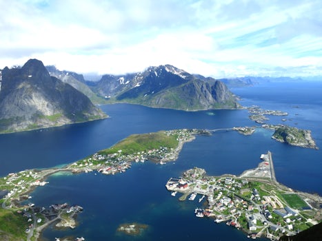 After a tough and steep hike, enjoying the view from Reinebriggen in Lofoten Island.