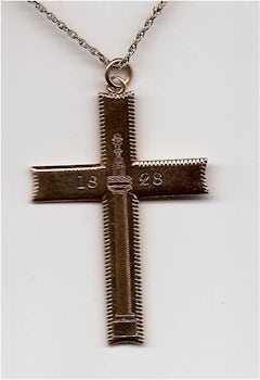 Close-up of gold cross given to ancestor in 1828 by local Baron in Gaibach