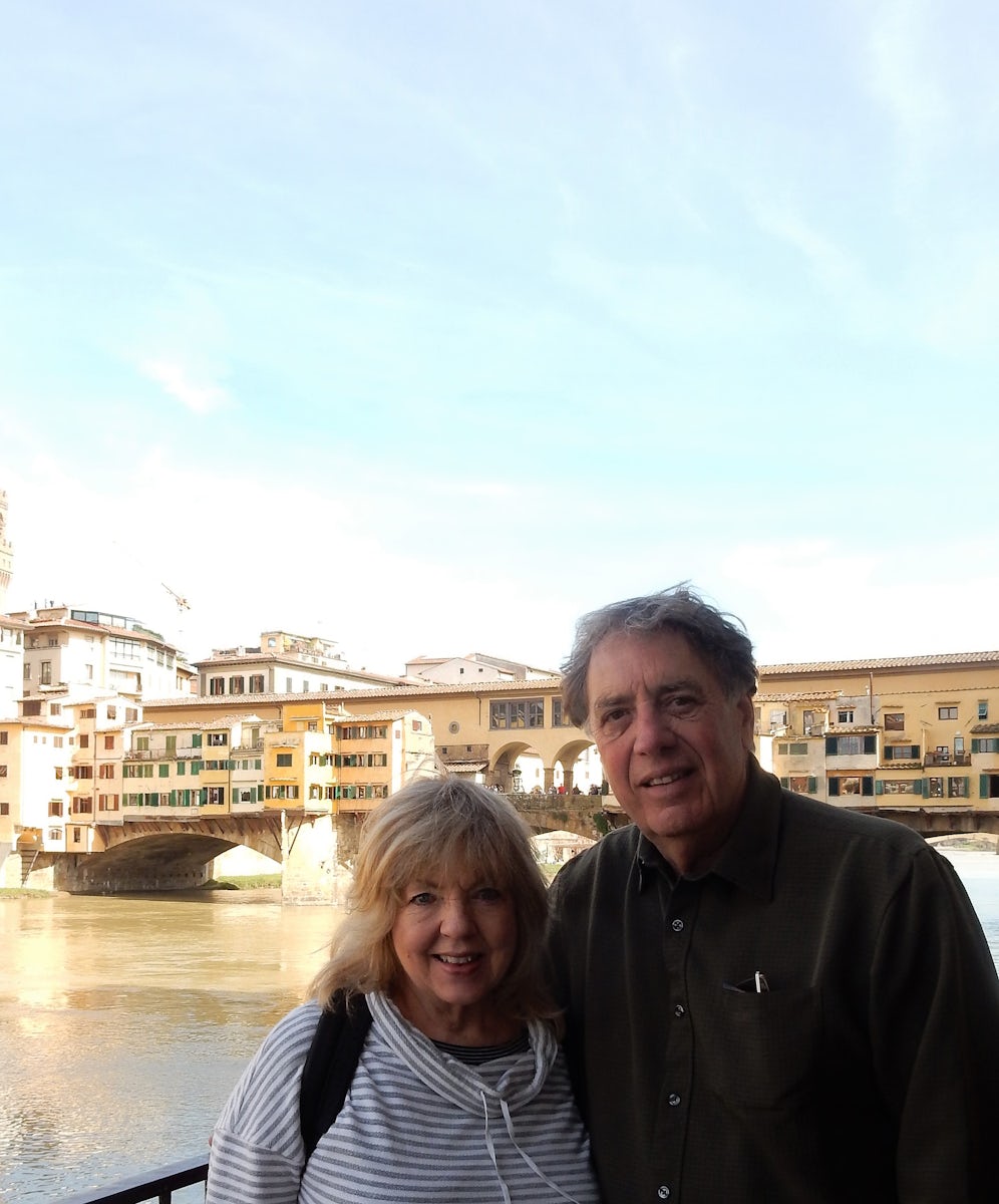 The Ponte Vecchio in Florence, Italy is in the background. it's a speci