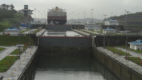 Cargo ship ahead of Carnival Splendor in the Panama Canal locks.