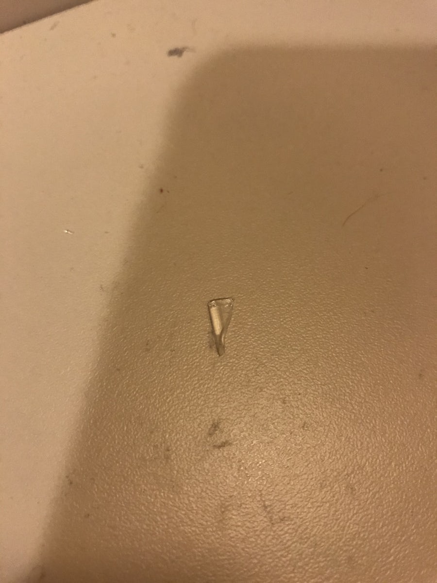Broken glass that wasn’t properly cleaned up out in the hall that wound up in my room and then in my foot.