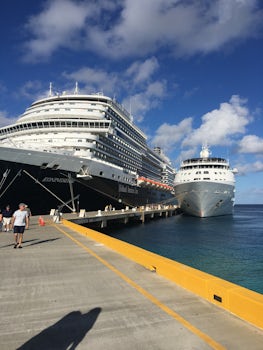Our little ship looking cute next to a big ship in Turks and Caicos. We met