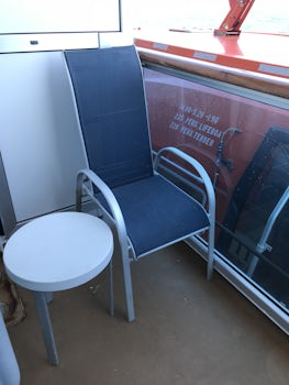 This is the size of our balcony on Royal Princess.    I think the guy who designs airplane interiors did this.   Pools were small, seats in Princess Theater narrow and crammed together.   No cup holders.  Air conditioning was iffy.    Energy efficiency is a priority but heard lots of people complain about heat.
