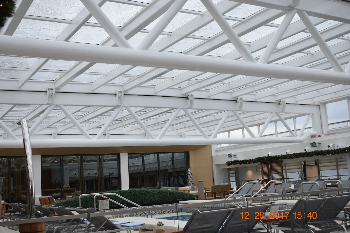 Viking Sky pool area with indoor cover in place