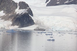 Le Boreal at base of glacier in Antarctia