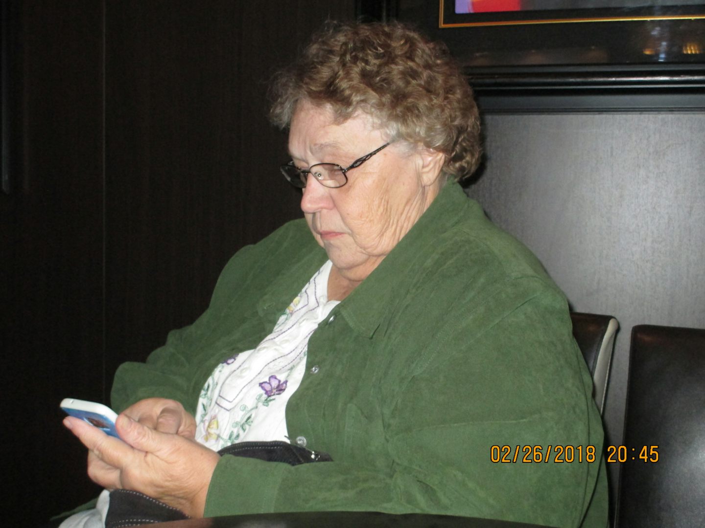 My friend Sharon using her cell phone to keep track of her memories.