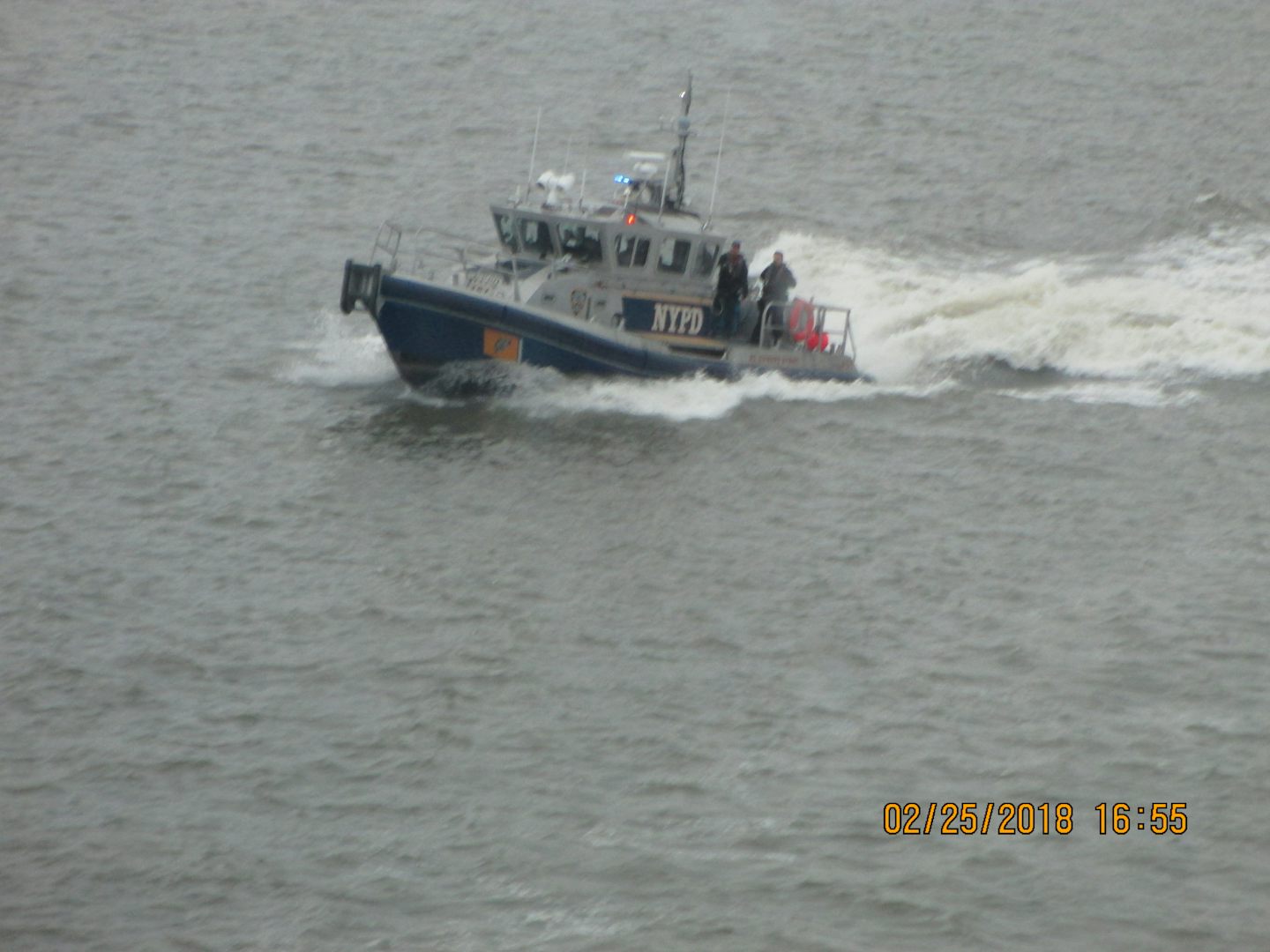The NYPD boat leaving the Breakaway.