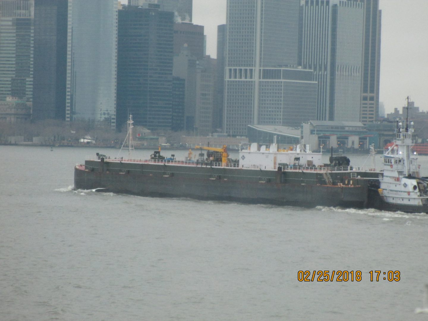 A barge in the Hudson River as we passed.