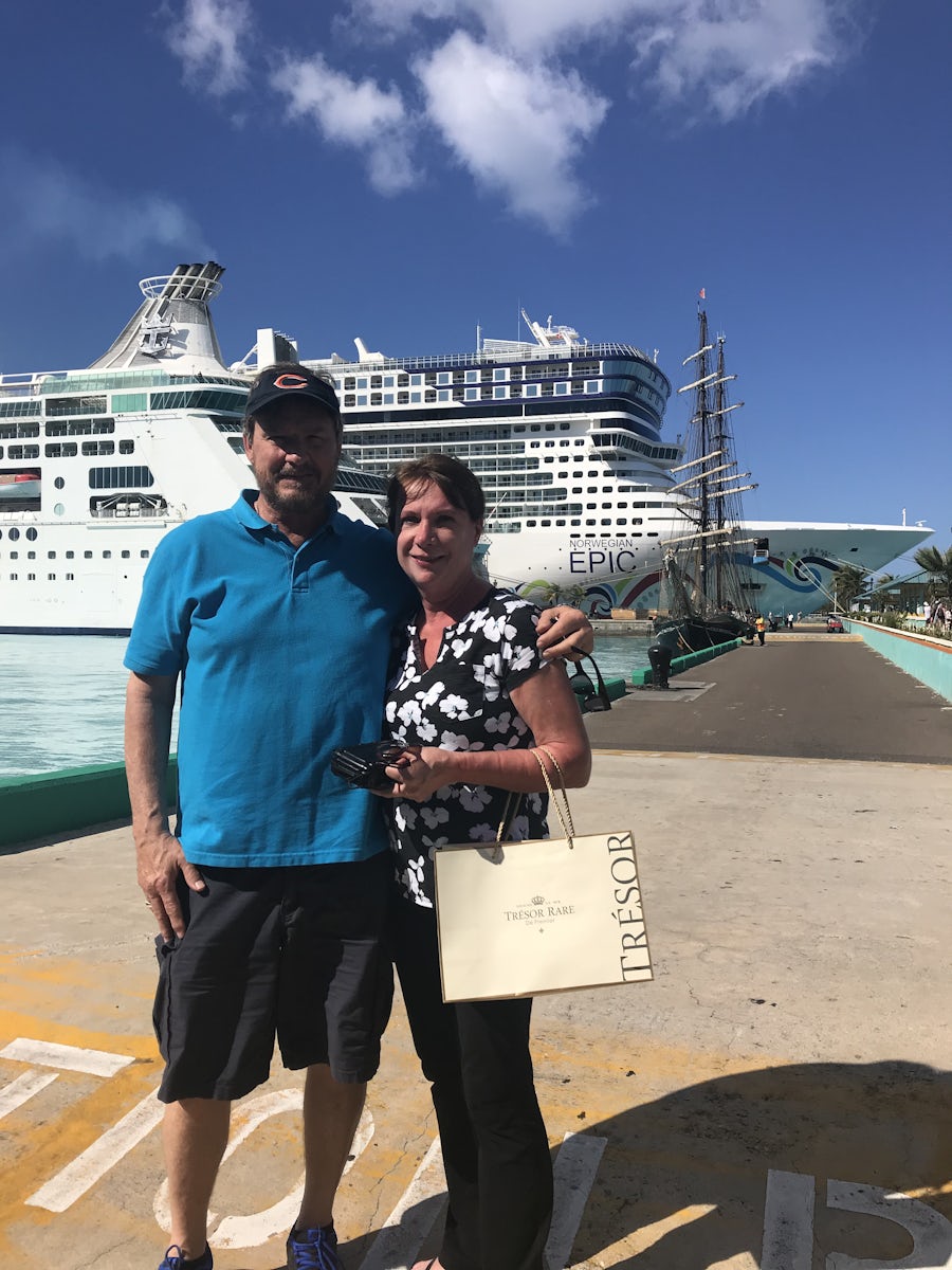 We had just finished our visit to Nassau and were coming back to our ship when I saw the opportunity for a great pic.
A Bahamian Po Po was kind enough to take our pic with Epic in background.