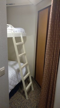 kids' bunk.  There is also a full closet with one hanging bar across th