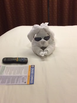 Towel figure with daily compass