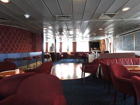 Vesteralen Lounge at rear of ship on Deck D. Bar open in evenings. Come her