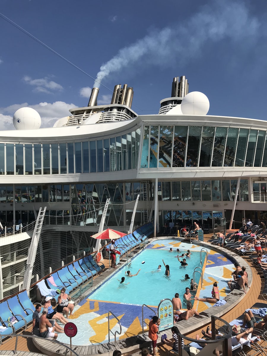 View of the multiple pools on deck 15, looking down from Deck 16