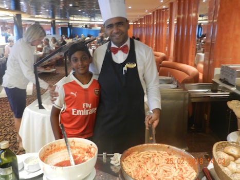 my 11 year old son with waiter Ashish and his favorite pasta