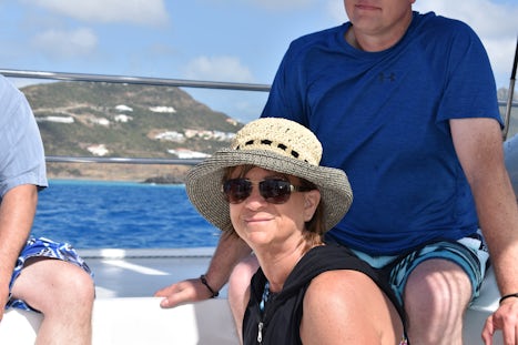 Riding on the catamaran to the dive site.