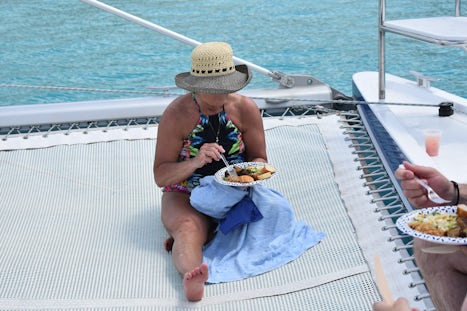 Lunch served by the catamaran staff, rib, chicken, rice, salad and rum punc