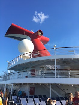 Spectacular Tail of Carnival Victory with its upper decks providing miniature golf, pools , food and activities.