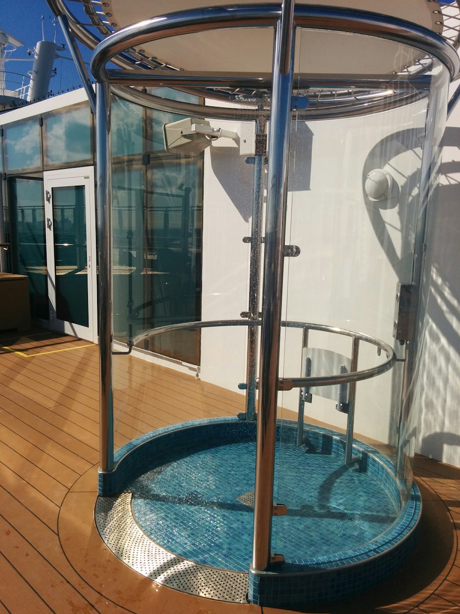 An outdoor shower located near the cantelever hot tubs.