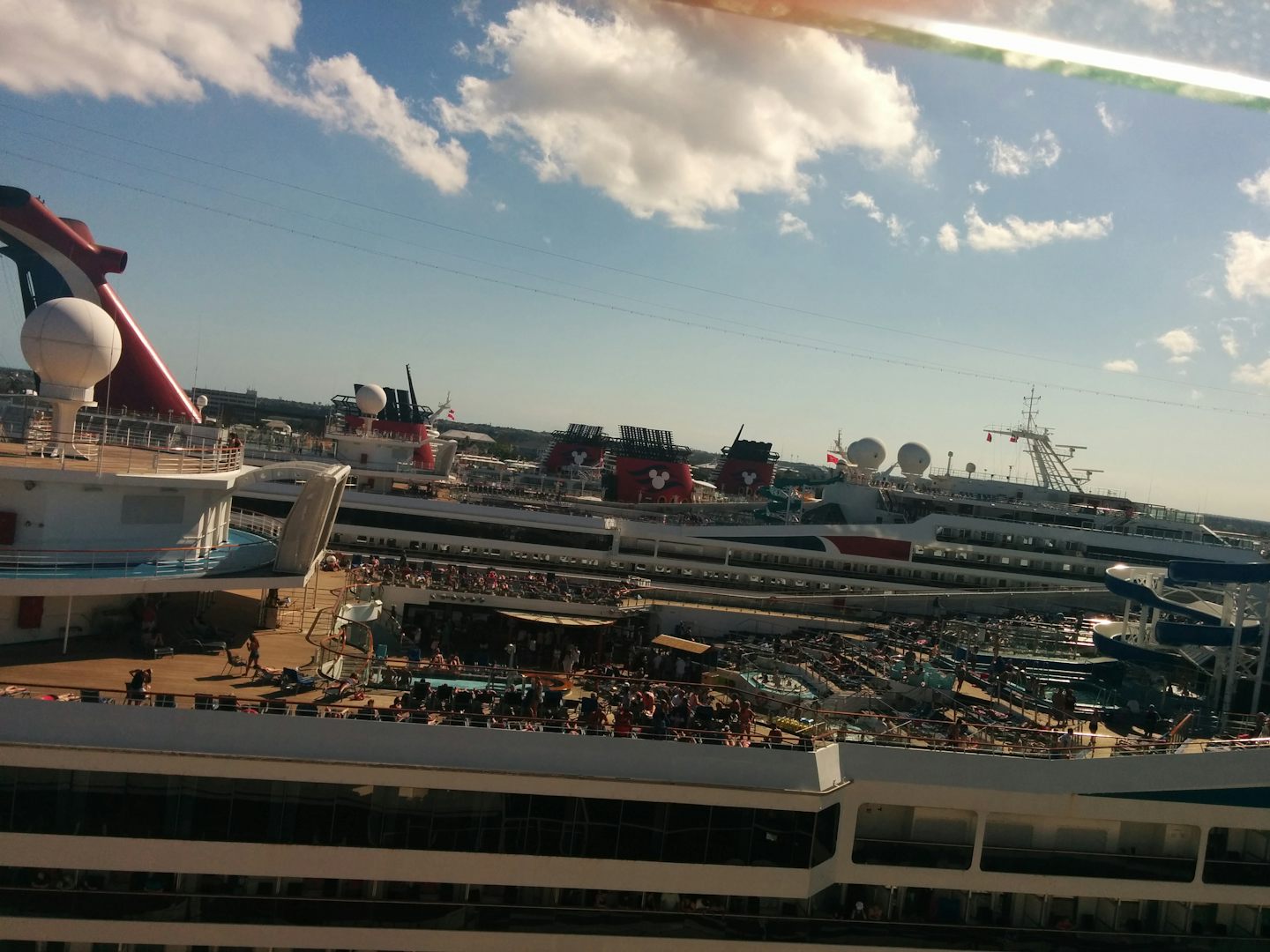 Adjacent Carnival, and two Disney cruise ships. I believe the Escape has the best pool deck of all.