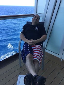 My husband on our private balcony