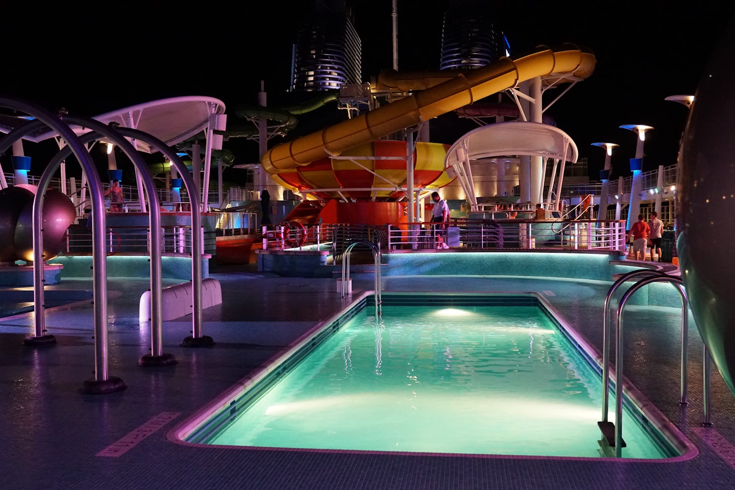 Deck 15 pool area at night
