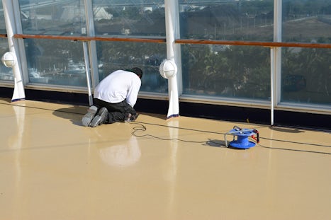 Drilling and sanding above. Dust flying off the deck onto the pool areas.