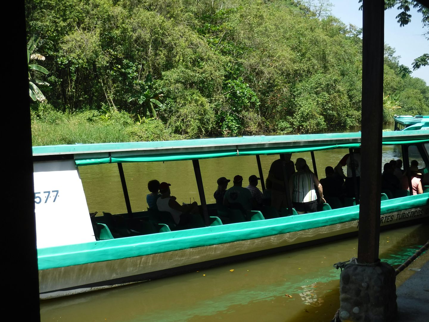 Part of our Costa Rica excursion was a river ride in a boat like this.  won