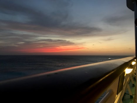 Sunset onboard the Adventure of the Seas on one of the top decks