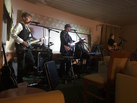 Band playing in ship lounge.