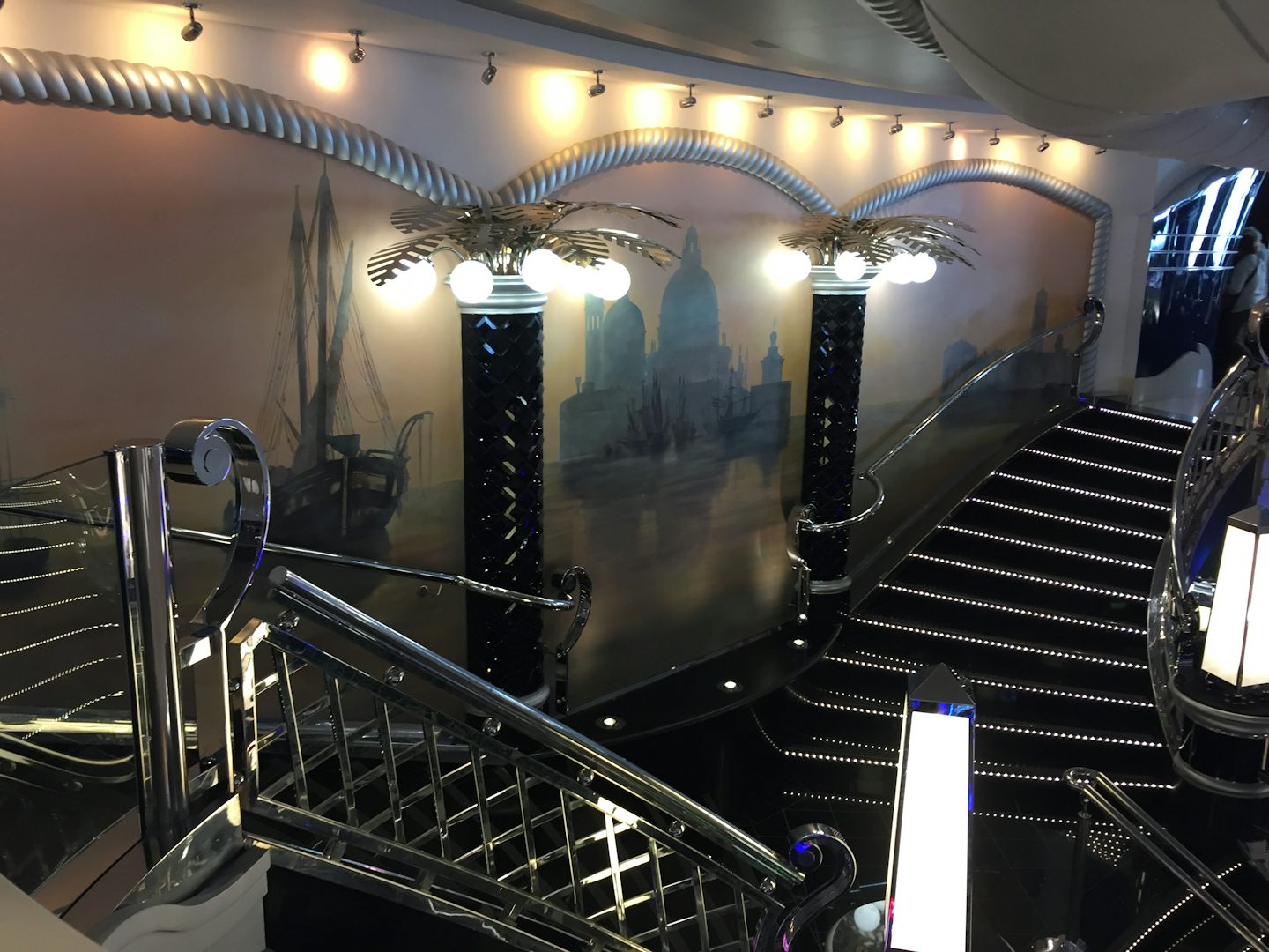 Beautiful stairways leading from Deck 7 Luna Lounge, to the casino on Deck