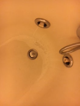 Filthy stained bathtub in Suite 6192