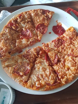 Room service pizza- horrendous quality dry and tasteless!