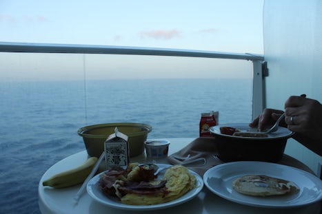 Breakfast on balcony of cabin.