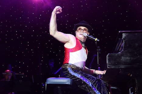 Almost Elton John performer.