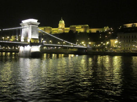 The Chain Bridge in Budapest with other beautiful lights in the background.