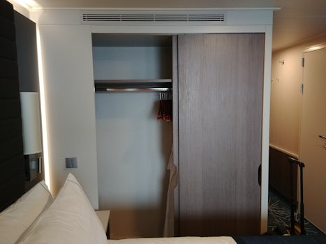 mini-suite room 11109 mid-ship. closet space, note hanging bar not high eno
